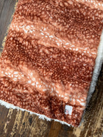 Adult Carmel Fawn Minky on Fur Blanket