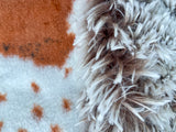 Adult Brown and Tan Cowhide Minky on Fur Blanket