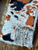 Adult Brown and Tan Cowhide Minky on Fur Blanket