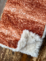 Adult Carmel Fawn Minky on Fur Blanket