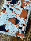 Adult Brown and Tan Cowhide Minky on Fur Blanket