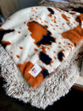 Adult Brown and Tan Cowhide Minky on Fur Blanket